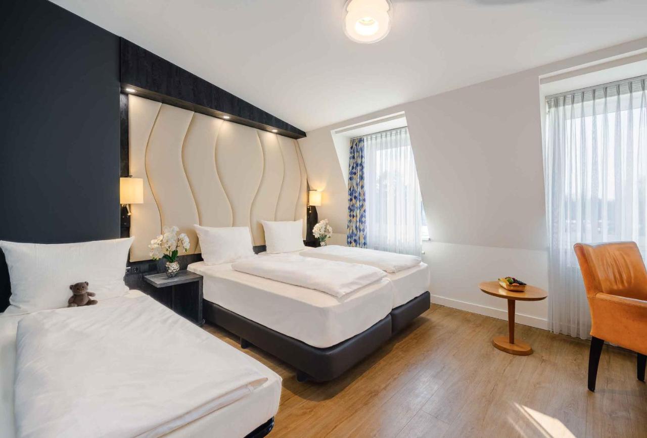 Plaza Inn Koeln พุลไฮม์ ภายนอก รูปภาพ