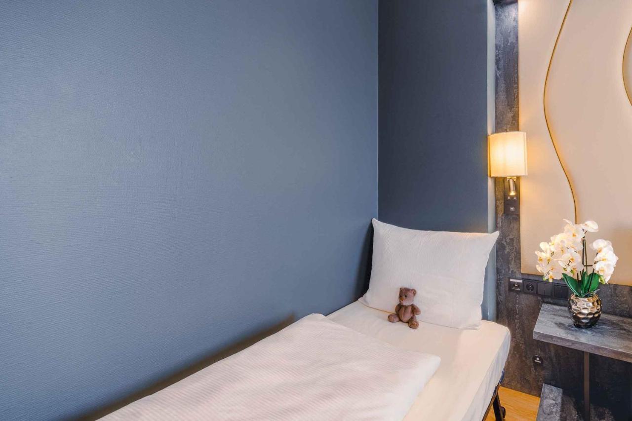 Plaza Inn Koeln พุลไฮม์ ภายนอก รูปภาพ