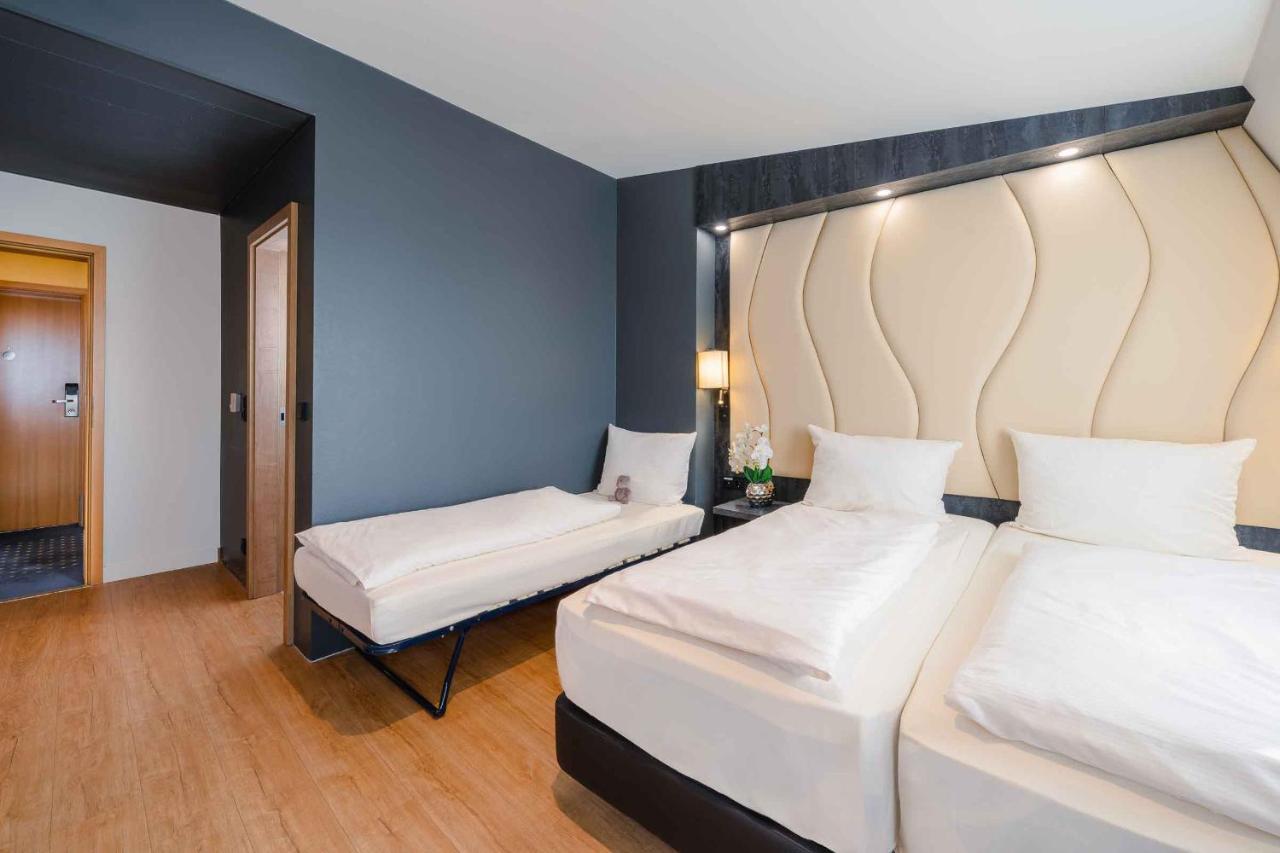 Plaza Inn Koeln พุลไฮม์ ภายนอก รูปภาพ