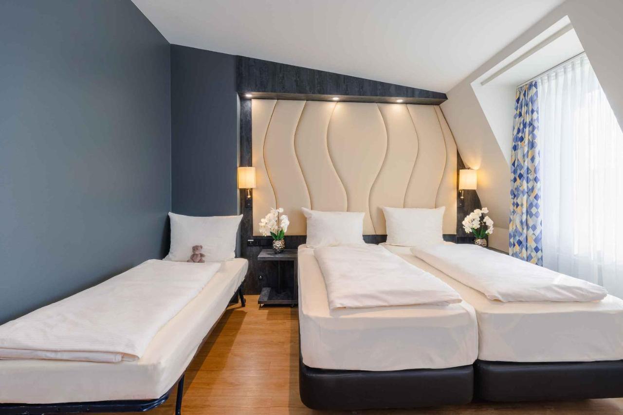 Plaza Inn Koeln พุลไฮม์ ภายนอก รูปภาพ