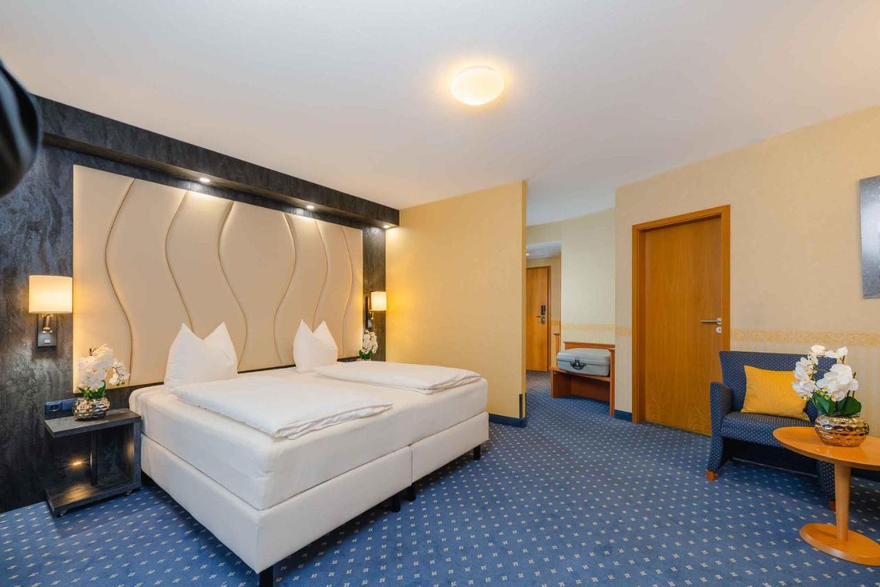 Plaza Inn Koeln พุลไฮม์ ภายนอก รูปภาพ