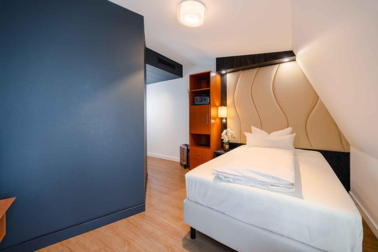 Plaza Inn Koeln พุลไฮม์ ภายนอก รูปภาพ